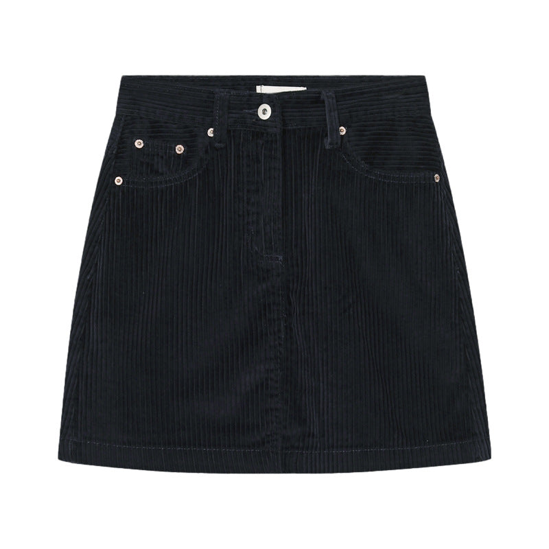 Black corduroy mini skirt on a white background