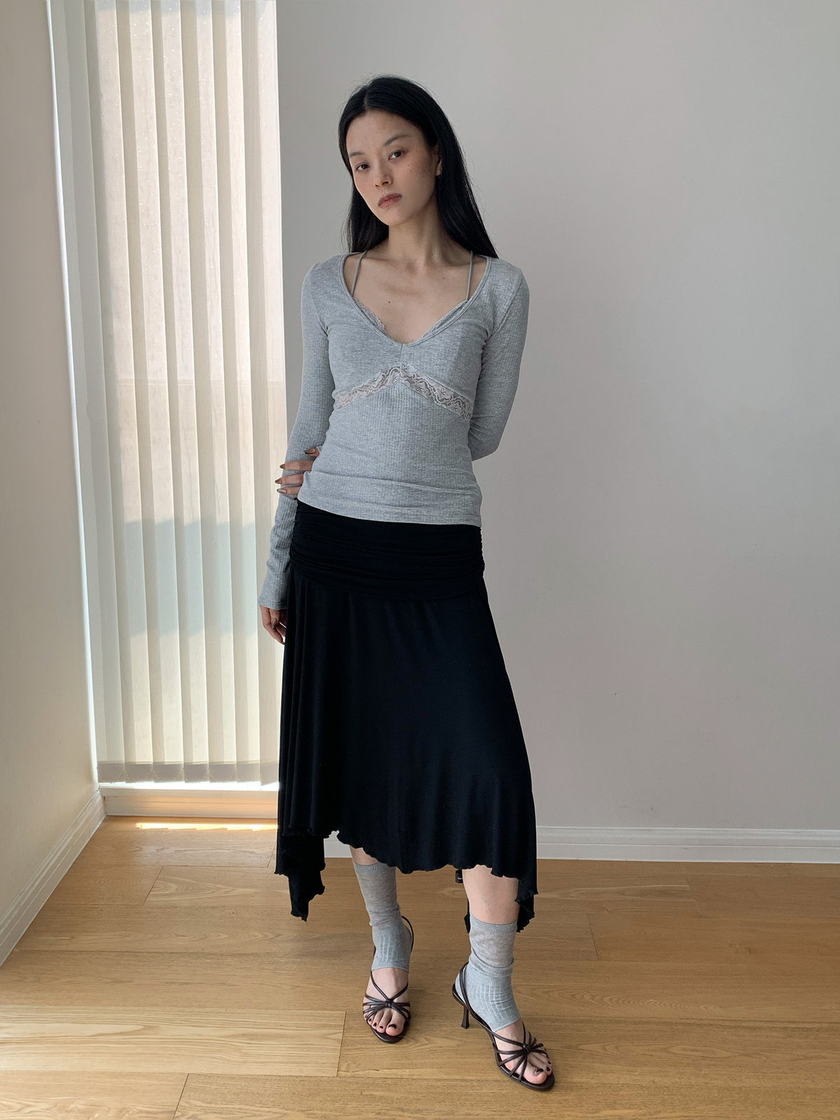 High-waisted Pleated Irregular Hem Midi Skirt